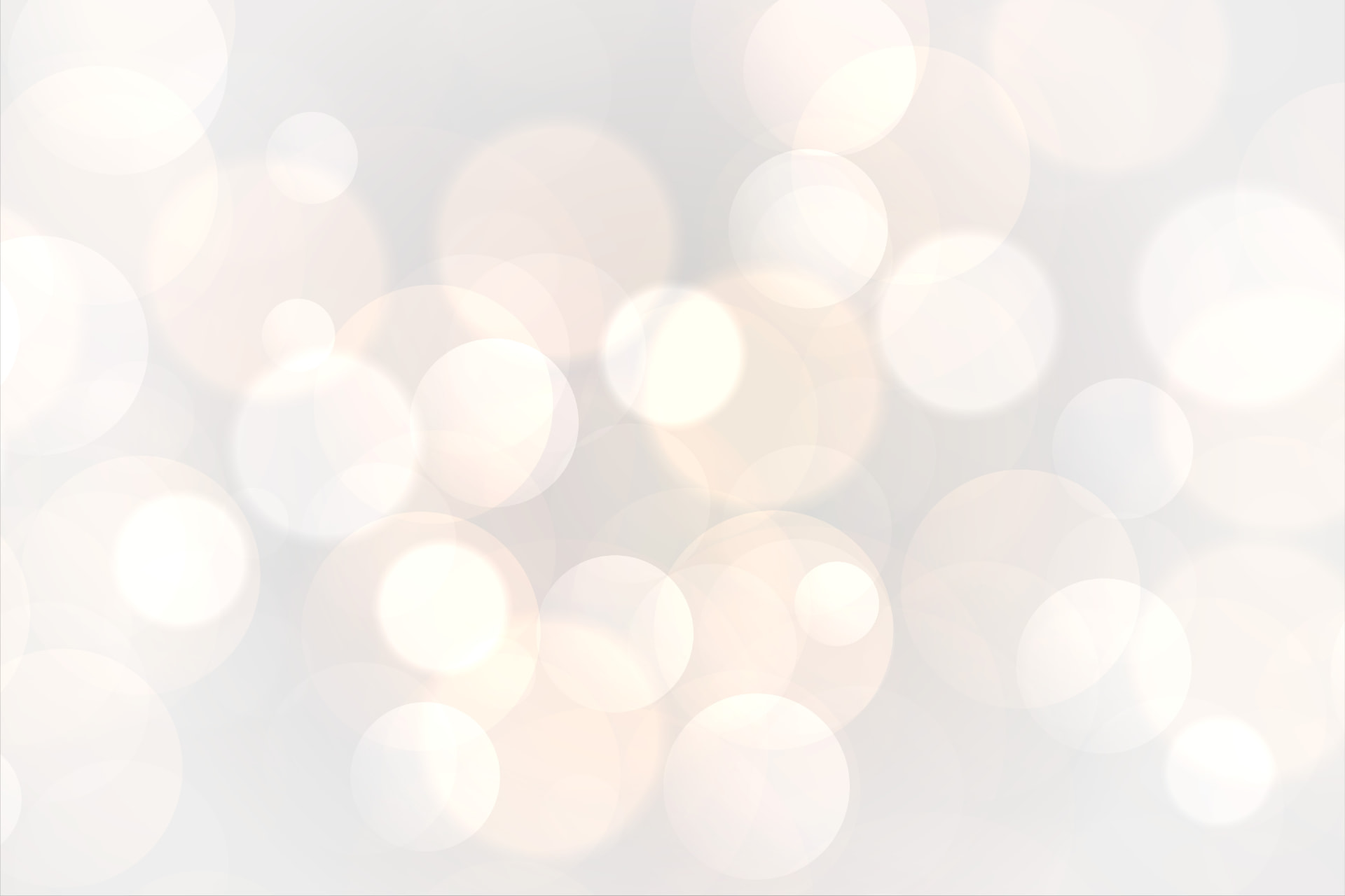 Soft pearl and warm gold bokeh lights